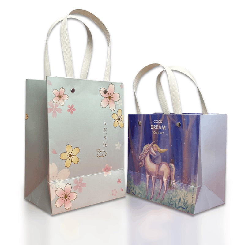 厂家定做精美牛皮白卡纸镭射眼镜童装服装店手提袋定制礼品袋纸袋