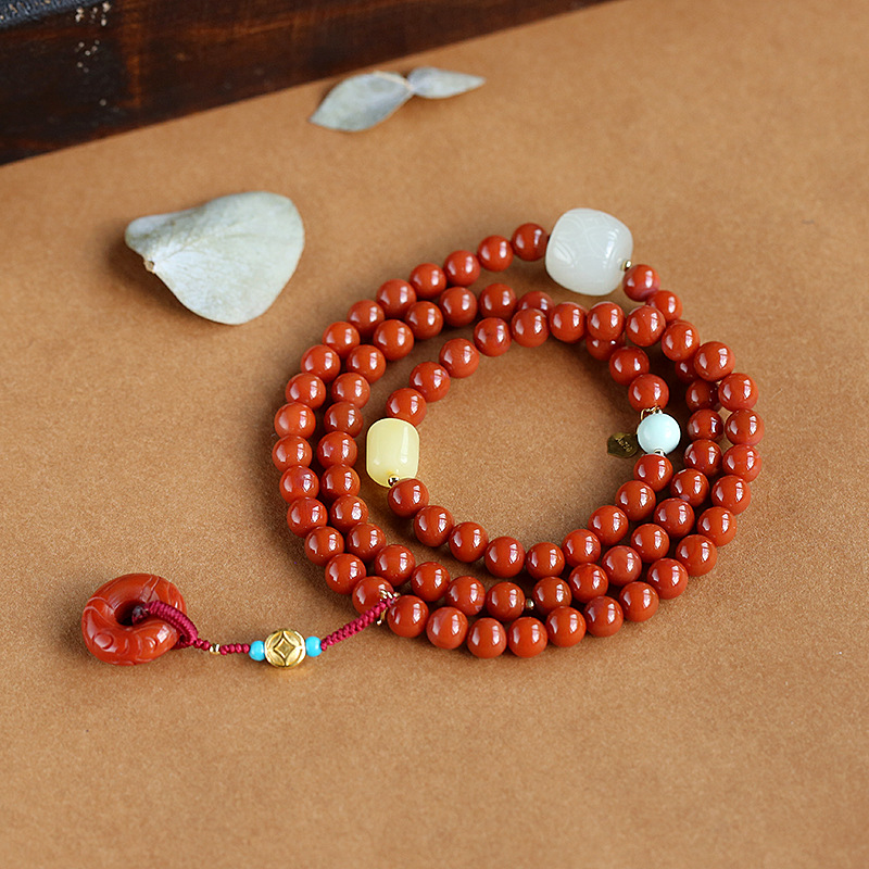 18K gold Sichuan Liangshan material Nan red agate three-circle beautiful matching carved peace buckle drip round bead bracelet, 6mm women's style