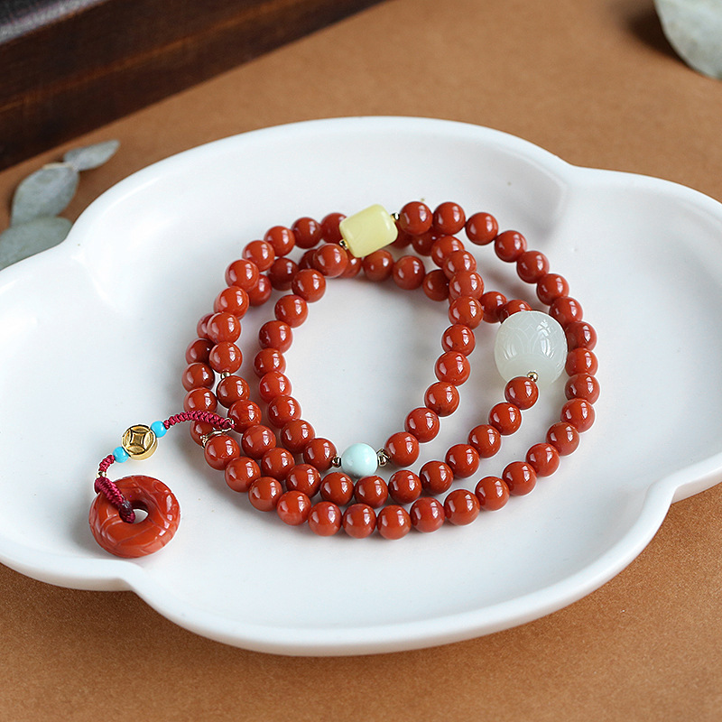 18K gold Sichuan Liangshan material Nan red agate three-circle beautiful matching carved peace buckle drip round bead bracelet, 6mm women's style details Picture