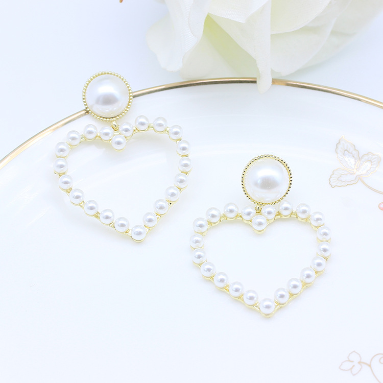 欧美跨境银针耳饰925创意时尚夸张合金桃心耳钉 镂空爱心珍珠耳环