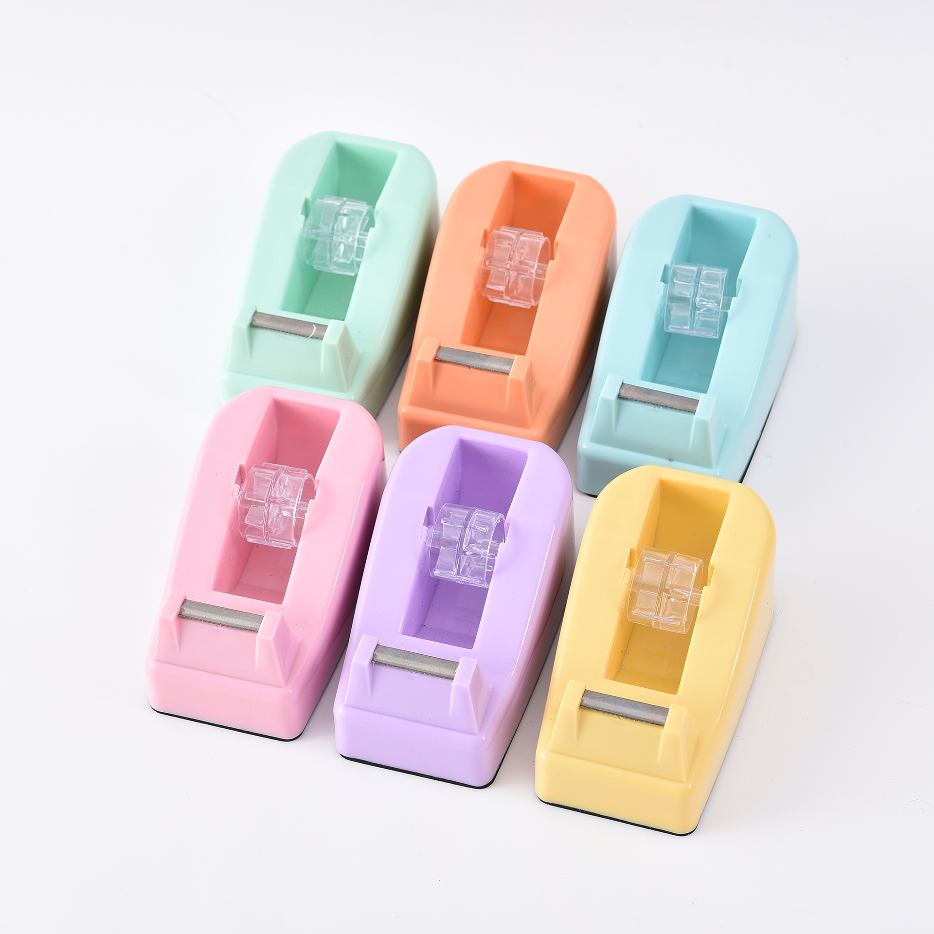 Factory direct supply of macaron-colored desktop small tape seat cross-border special color plastic office creative cutter details Picture