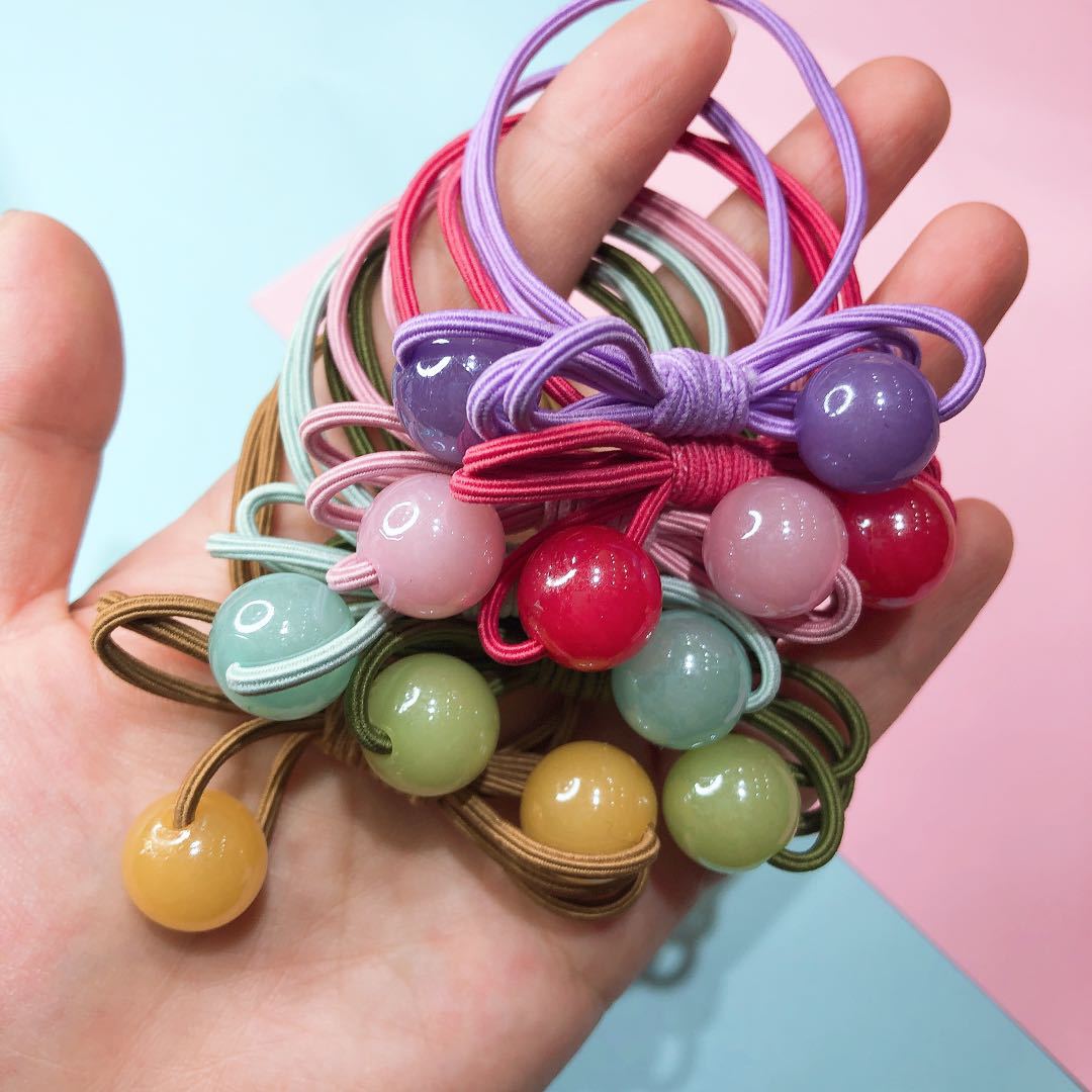 No. 111 Bee Double Jelly Beads 100 per bundle. Colorful Bee Double Jelly beads. Adult hair tie. Women's leather case. Simple hair tie. Rubber band. Ponytail tie. Hair accessory Specification image