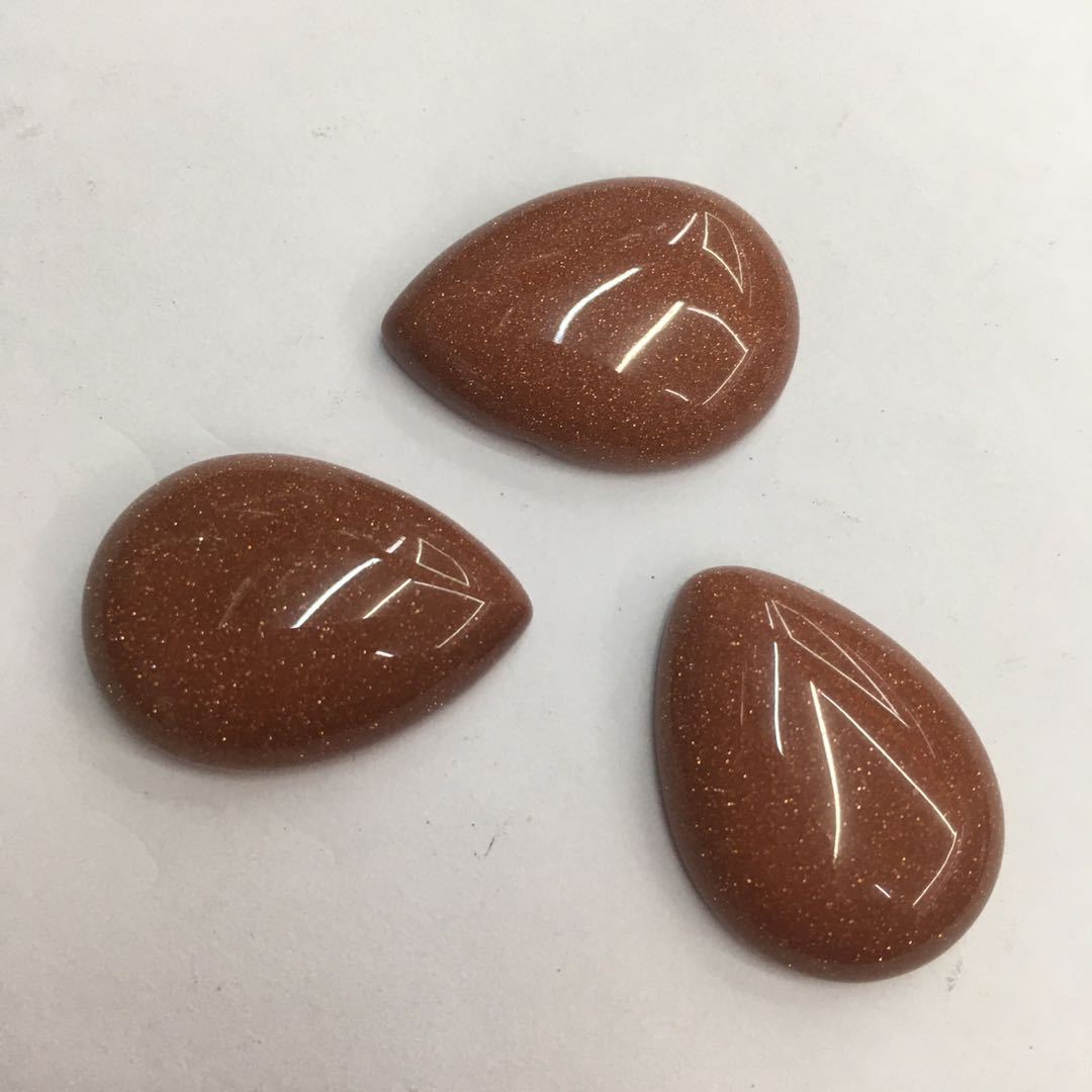 Cross-border direct sales of new golden sand stone water drop ring face, European and American fashionable agate rough stone semi-precious stone wholesale accessories Application Scenario