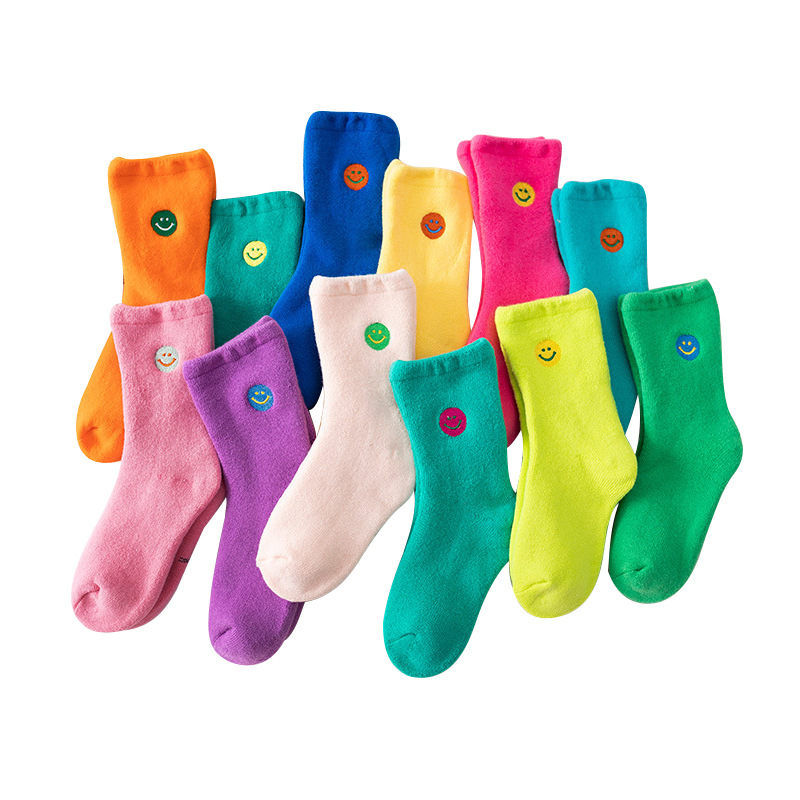 Wholesale of thickened children's socks, cartoon embroidered smiling face towel socks, and plush socks for boys and girls in autumn and winter Item Picture