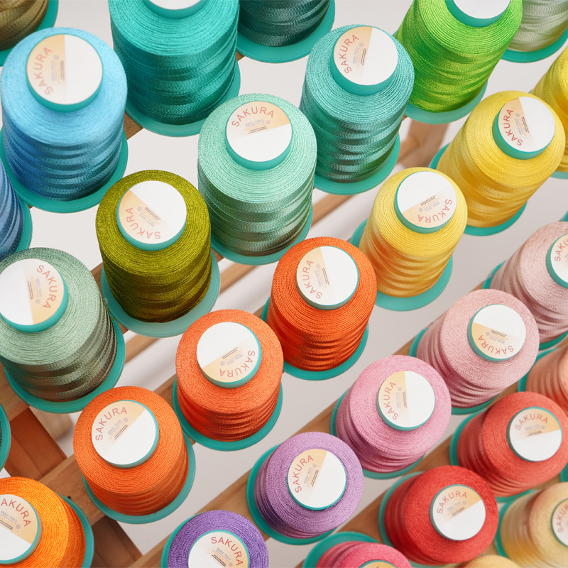 樱花牌75D/2人造丝绣花线有光套装600色手推绣娃衣电脑绣花批发线