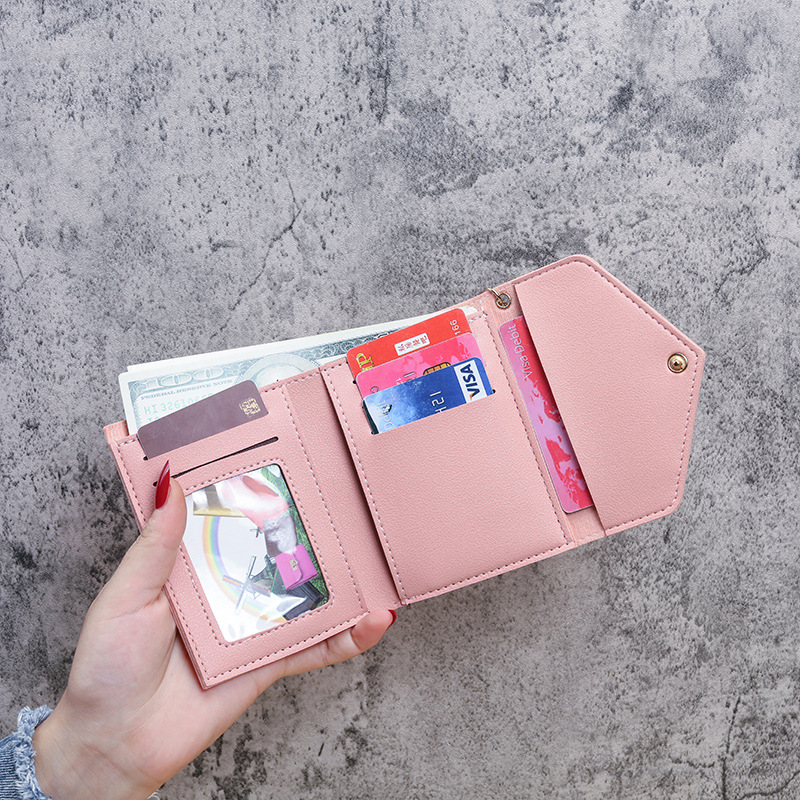 Venta directa de fábrica nuevo estilo mujer billetera mujer borla colgante litchi patrón clip de dinero tarjeta bolsa cero billetera en stock al por mayor details Picture