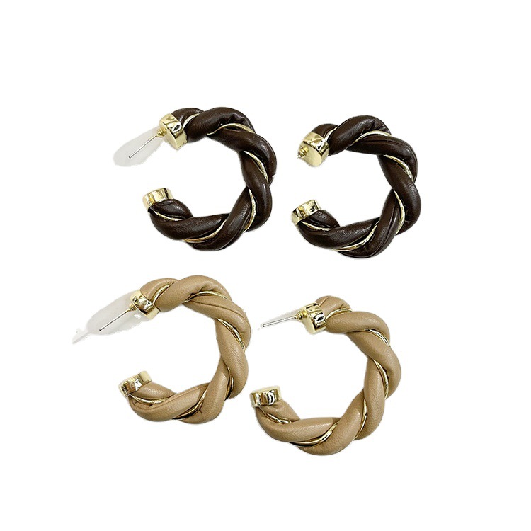 Manufacturer's French retro stud earrings, leather twist metal spliced C-shaped earrings, twisted earrings, European and American style earrings Item Picture