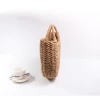 One-piece delivery of new spring and summer straw woven bags, paper rope round bucket bags, simple woven bags, women's retro style casual hand-held bags, and national trend bags Application Scenario