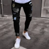 Cross-border European and American badge men's jeans, trendy knee ripped zipper skinny pants, ripped men's denim long pants Application Scenario