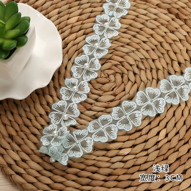 Single-layer beaded four-leaf clover lace, colored premium polyester lace, each piece of 20 yards in stock Application Scenario