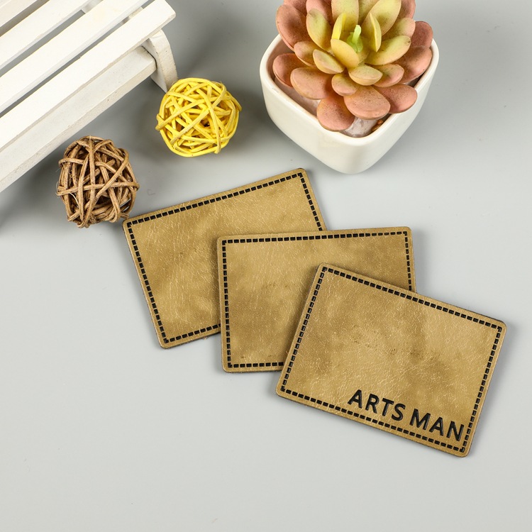 批发压花logo皮标PU仿皮商标皮牌服装箱包商标供应皮标