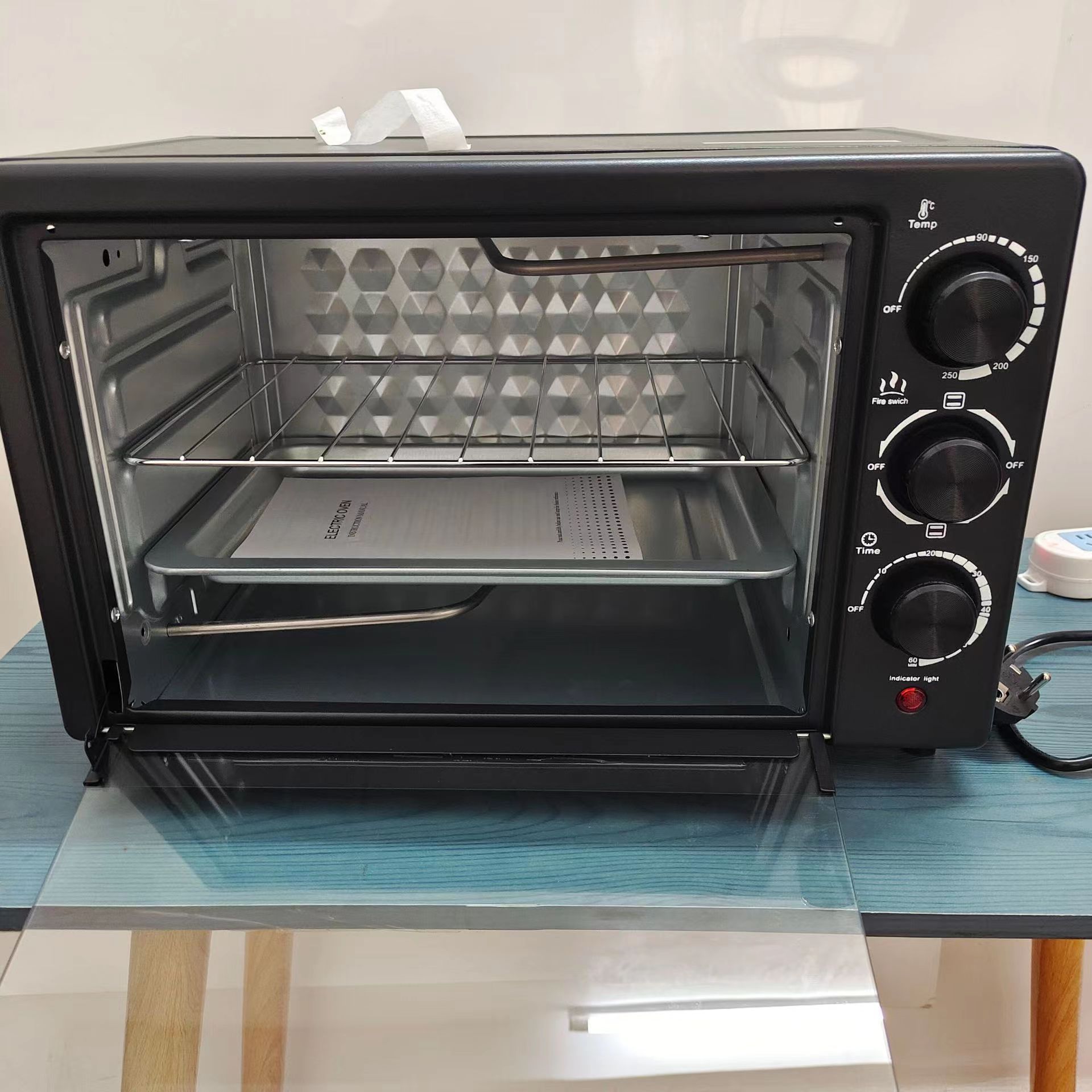 Household oven, electric oven, 25L large-capacity steaming and baking integrated cake machine, multi-functional bread machine, oven wholesale