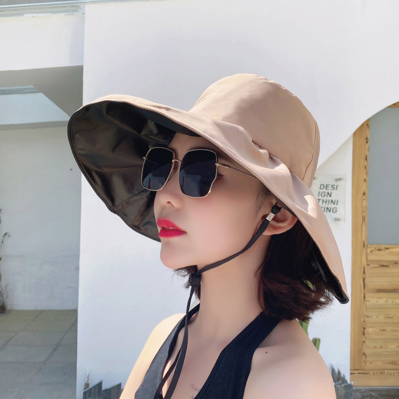The manufacturer wholesals new black rubber wide-brimmed hats, outdoor sun hats, foldable spring and summer women's fisherman hats and sun hats Item Picture