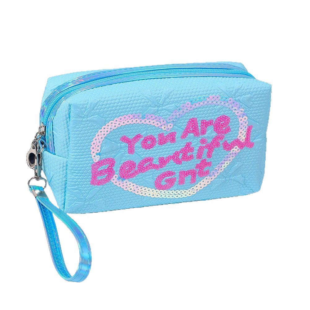 Wholesale of new cross-border sequined octagonal makeup bags, creative heart-shaped storage bags, portable travel hand-held toiletries bags Item Picture