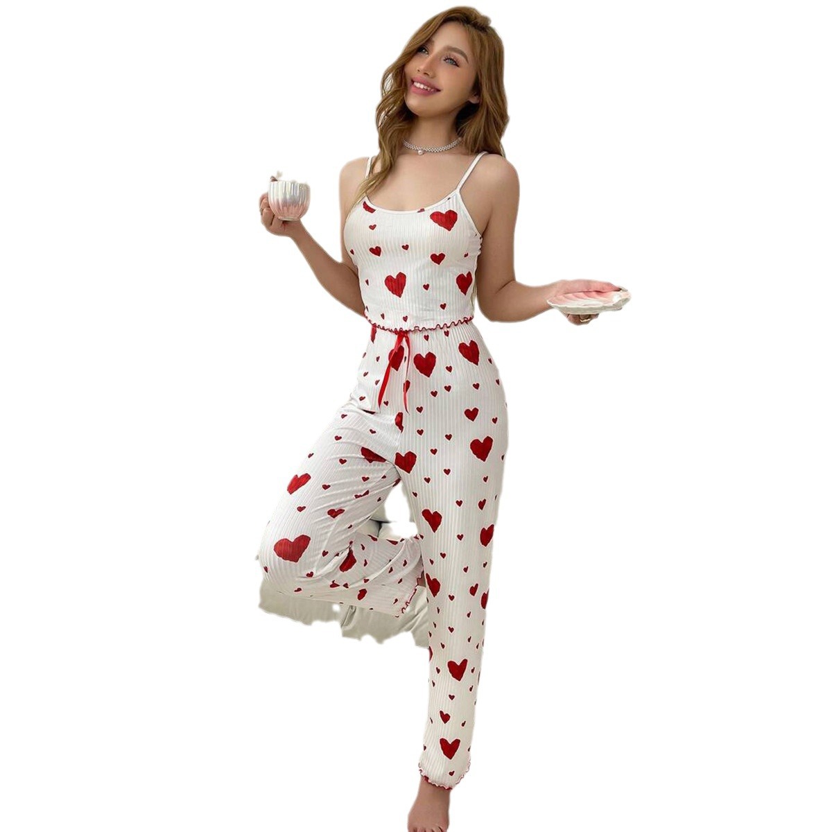 YANNI, a popular cross-border home wear from Europe and America, features a striped heart-shaped halter top and pajamas. It's a two-piece set that women can wear with long pants Item Picture