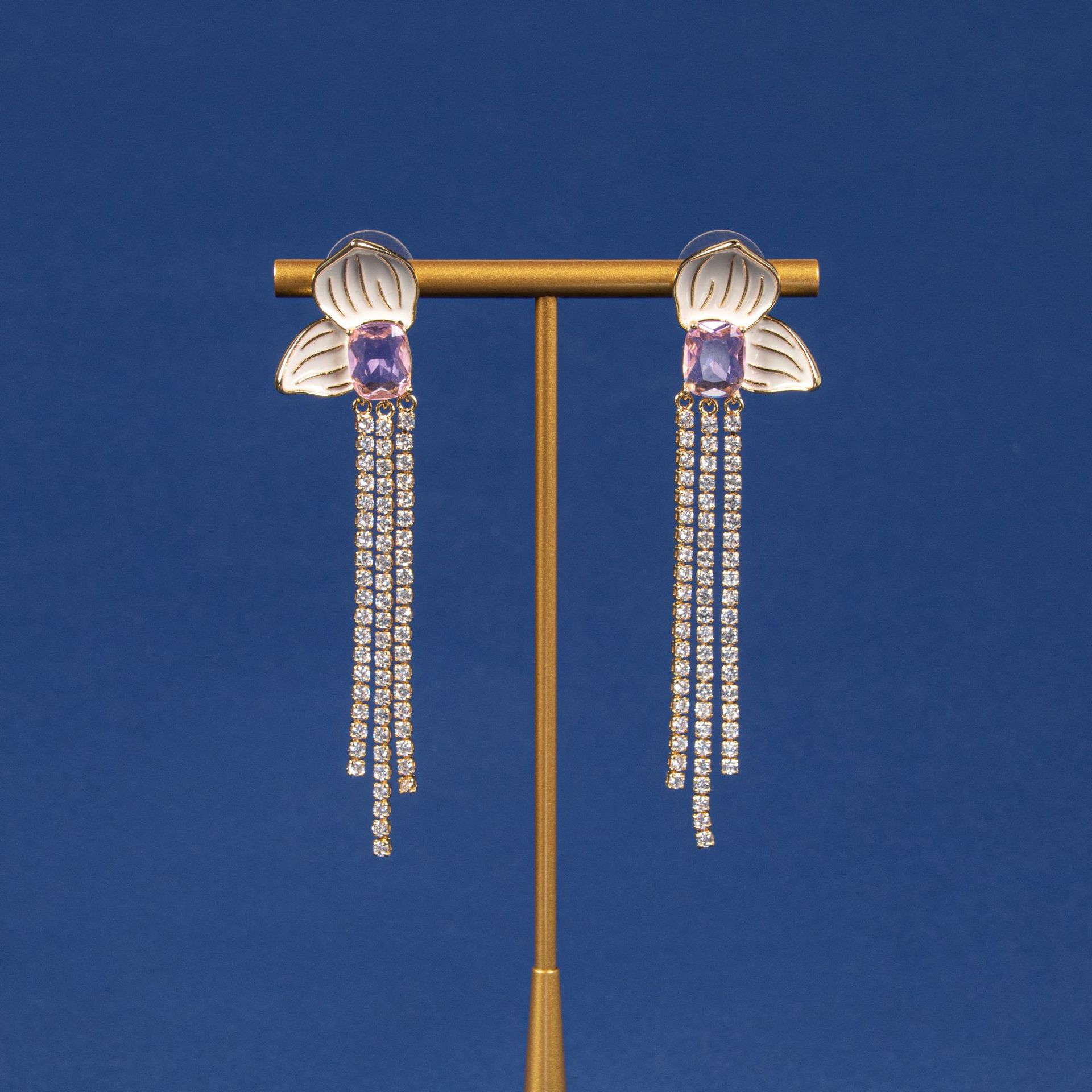 European and American fashion versatile butterfly tassel earrings, light luxury and cold style design earrings, silver needle women's European and American style accessories