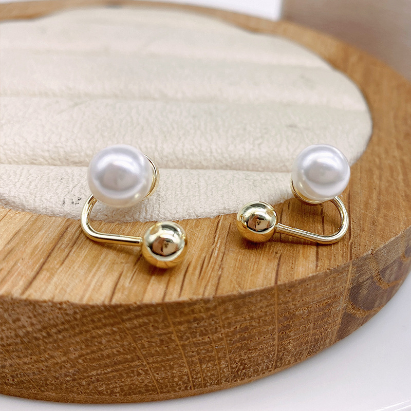 Obi new S925 silver needle pearl temperament sense earrings senior design sense of women's earrings fashion wholesale simple Application Scenario