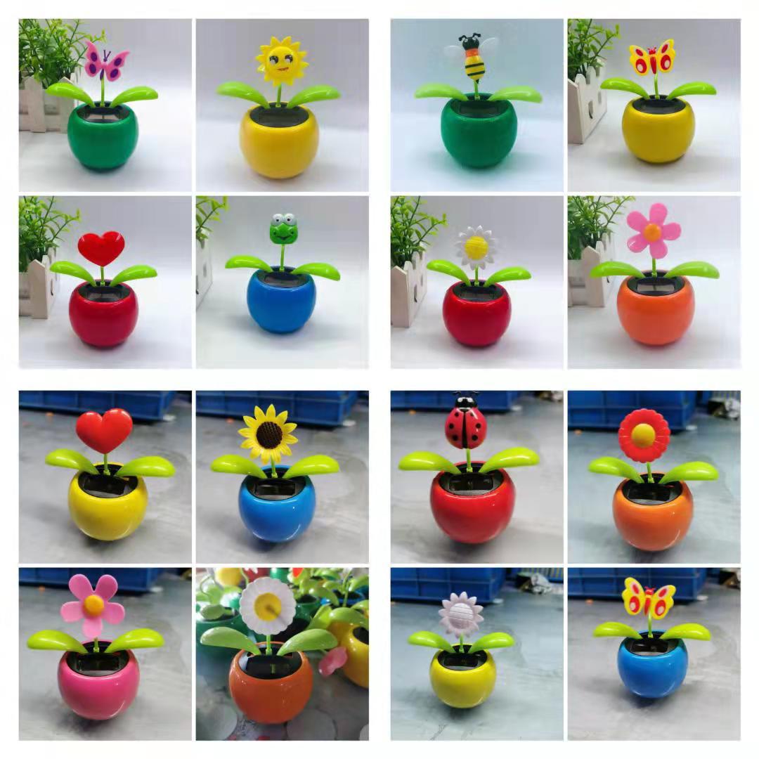 The manufacturer supplies solar-powered apple flower car interior ornaments, office supplies, personalized flower heads and cute dolls