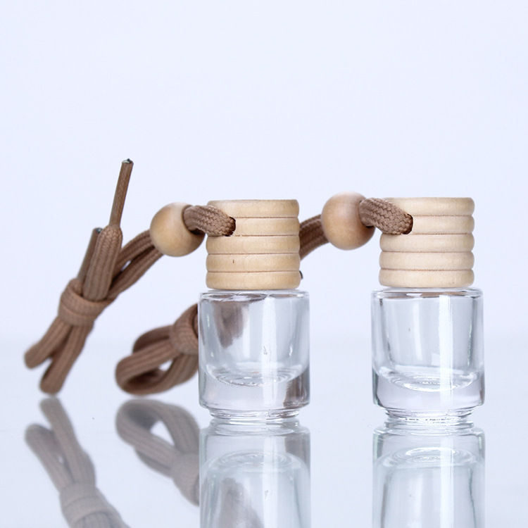 Cross-border wholesale 5ml creative wooden cap transparent pendant, essential oil pendant, glass cylindrical bottle, aromatherapy perfume empty bottle details Picture