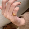 Retro style vintage brushed iris flower ring, a niche design for women's index finger ring, with a light luxury and high-end exquisite tail ring Application Scenario