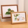 Wholesale of photo frames, 6-inch photo frame display stands, decorative items, photo walls, 7-inch and 8-inch a4 creative, simple, arc-shaped wooden puzzle frames details Picture
