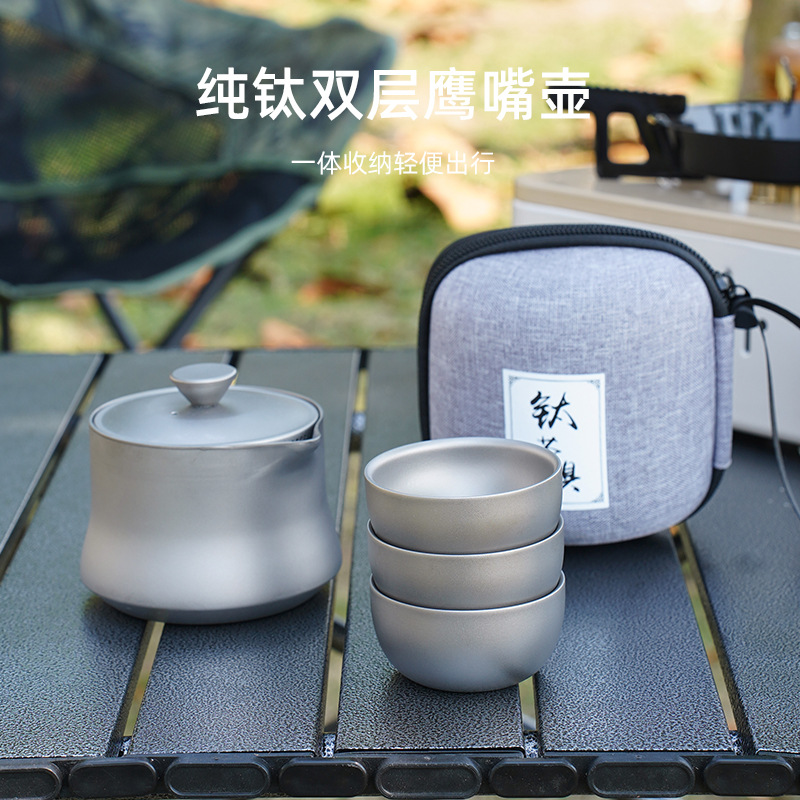 Pure titanium Chinese-style travel kung fu tea set, high-end double-layer quick guest cups, one pot and three cups portable package for outdoor use