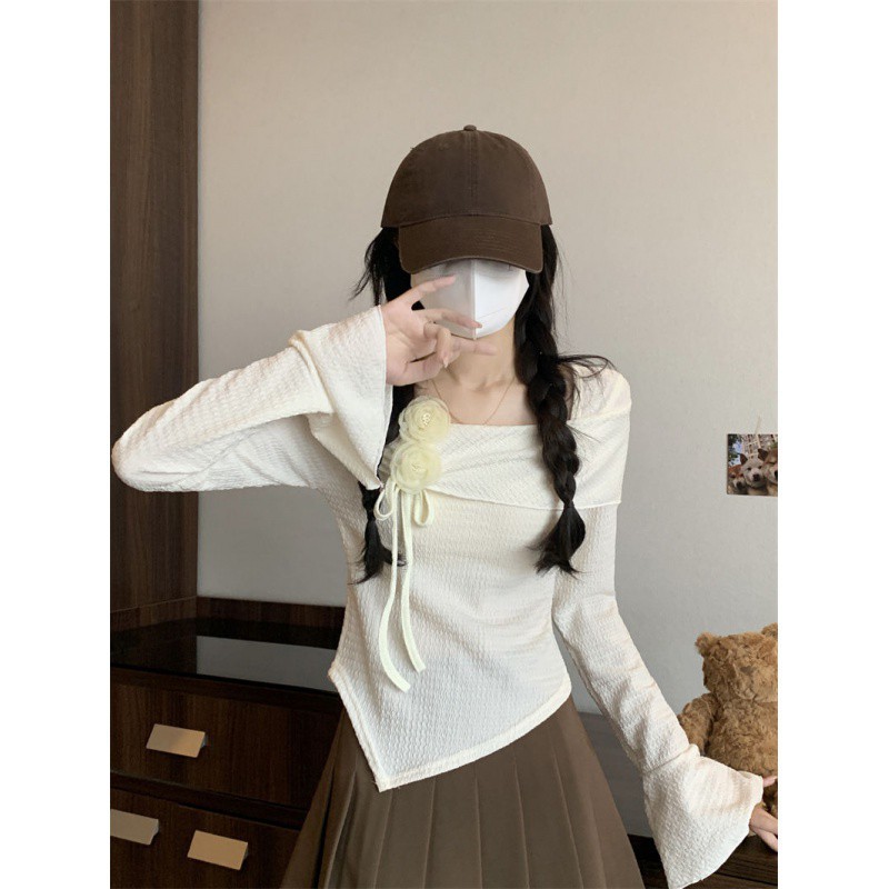 Korean style fashionable and elegant autumn new women's wear, beautiful design sense, slim and irregular long-sleeved short top Specification image
