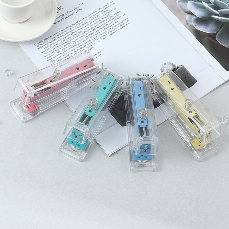 The manufacturer customizes candy-colored transparent stapler, InS-style student stapler in various sizes, and office labor-saving binding machine details Picture