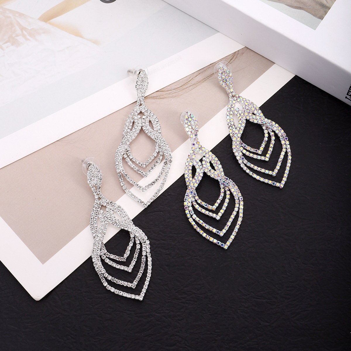 Wholesale of Japanese and Korean style personalized, fashionable and luxurious full-diamond earrings, long multi-layer teardrop-shaped welded earrings, and evening dress accessories