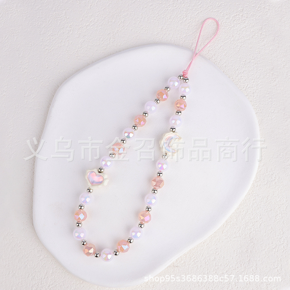 Fashionable heavy industry cat's eye stone optically plated with star and moon, high-end crystal, mobile phone chain pendant, camera lanyard, women Application Scenario
