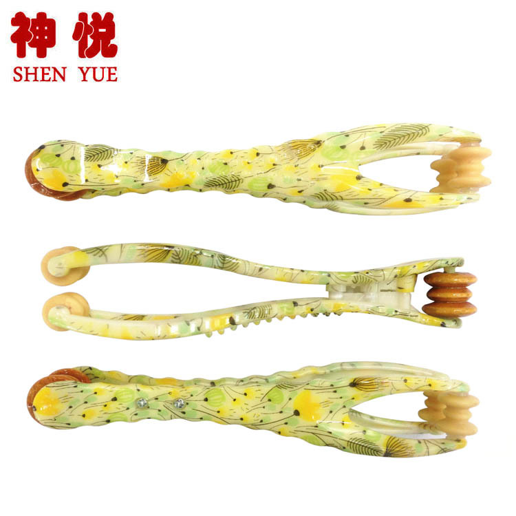 512厂家直销手指按摩器滚轮手指穴位按摩手指手关节按摩器