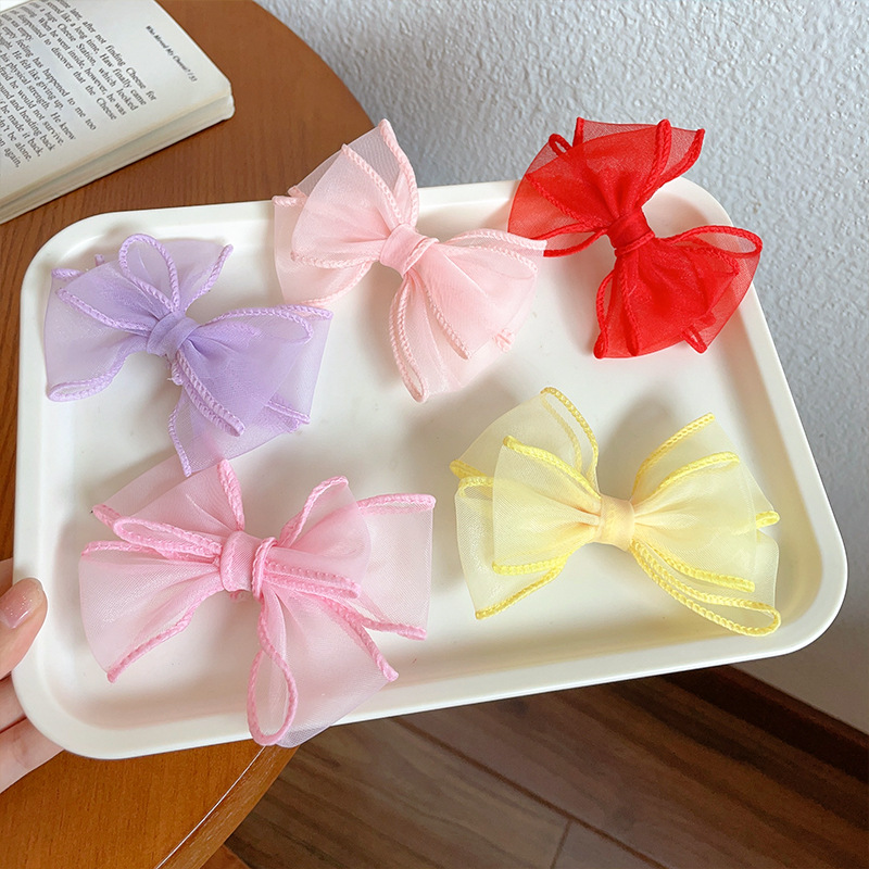 Korean lace girl princess bow hair clip headwear, children's super ethereal charm, girl side clip and top clip hair accessory Application Scenario