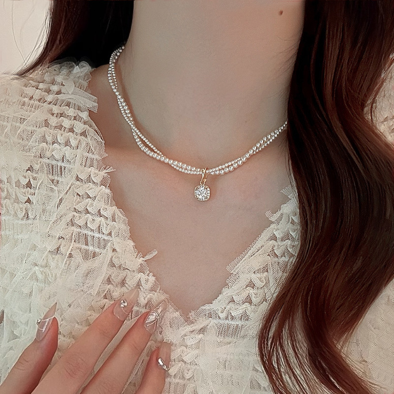 双层叠戴珍珠项链女秋冬轻奢高级感小众毛衣链吊坠锁骨链颈链饰品