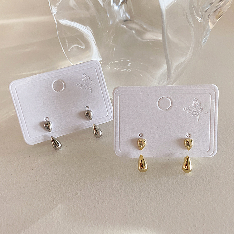 A Pair Of Women Wearing Water Drop Metal Earrings South Korea Simple Everything Temperament Personality Fashion Studs Earrings Cold Wind details Picture