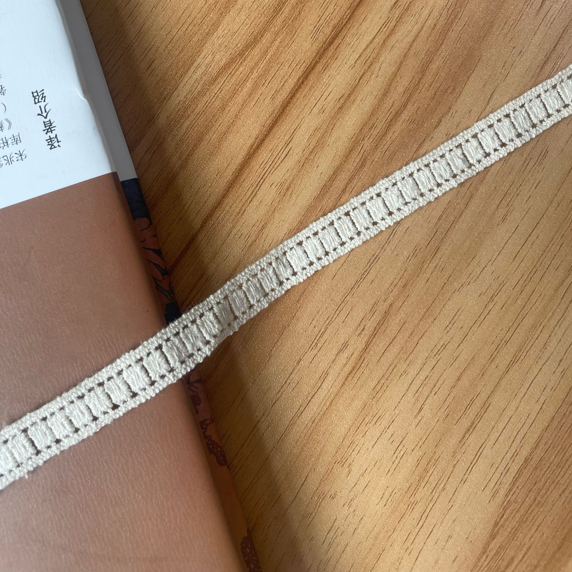 Shantou manufacturer water-soluble cotton thread barcode computer embroidery lace small strip trim women's and children's clothing accessories A0456