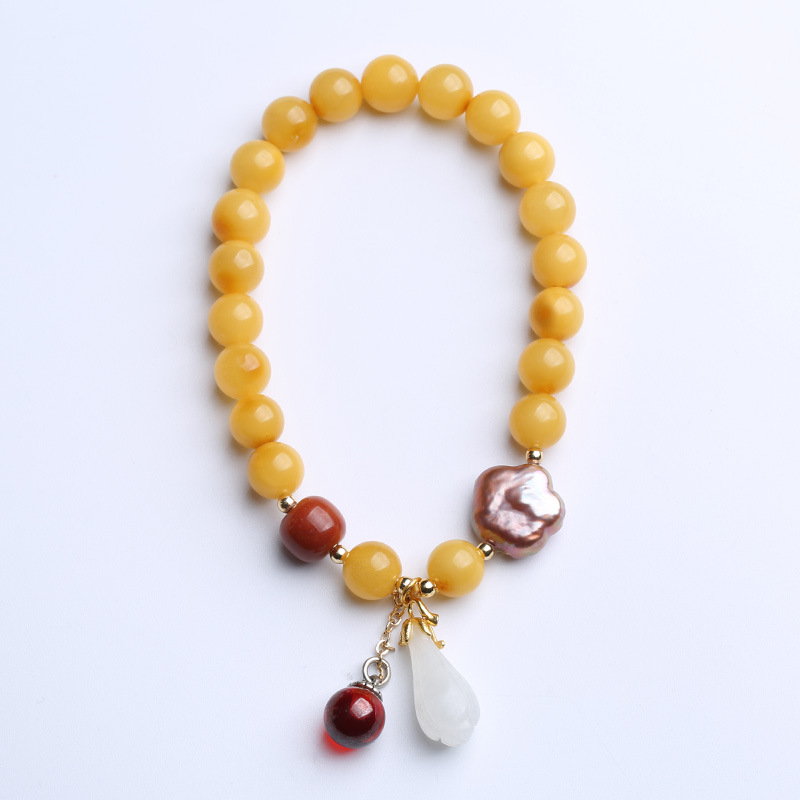 Natural beeswax single-loop bracelet for women, white magnolia flower and freshwater pearl blood amber south red diy bracelet, Chinese style Item Picture