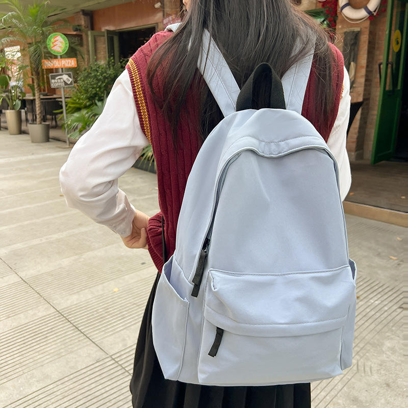 日系无印风双肩包男女大学生韩版大容量纯色背包初中高中学生书包