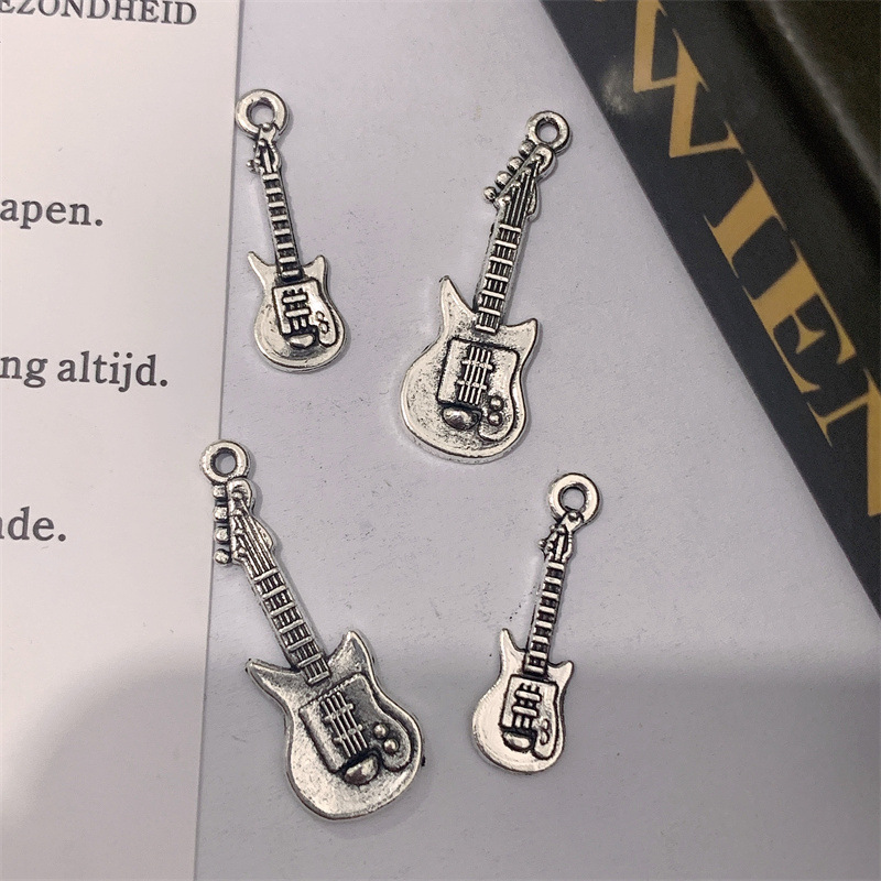 DIY zinc alloy jewelry accessories, retro guitar accessories, sweater chains, keychains, pendants, handcrafted jewelry pendants details Picture