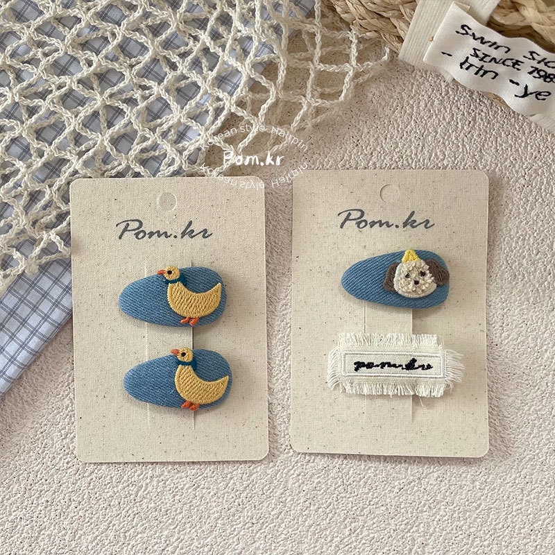 New Korean-style denim cartoon hair clips, children's fabric side fringe bangs clips, oval little duck pair hair clips Application Scenario