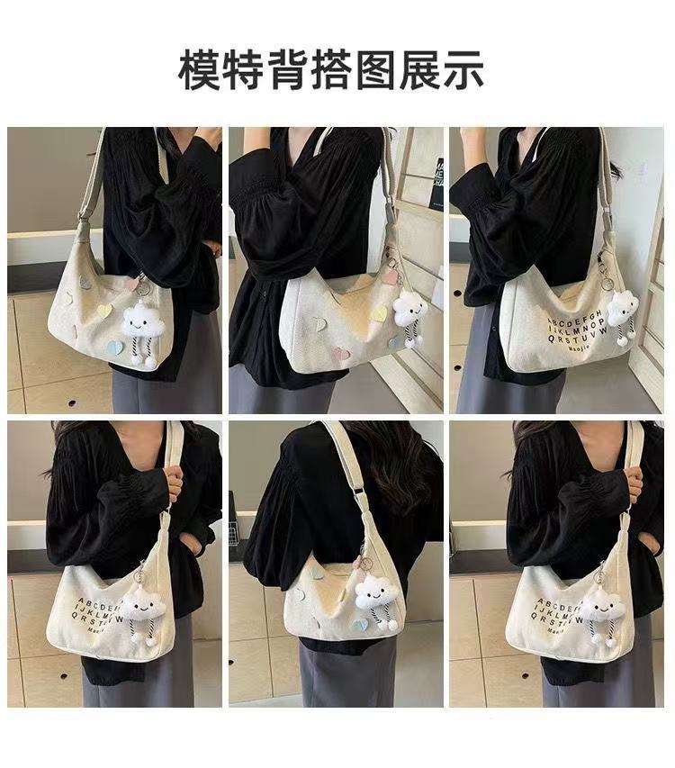 休闲帆布斜挎包女2025新款大学生上课潮牌小众百搭通勤单肩饺子包详情2