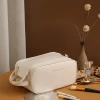 New large-capacity cosmetic storage bag, portable high-appearation-level pu leather three-layer organ pillow cosmetic bag details Picture