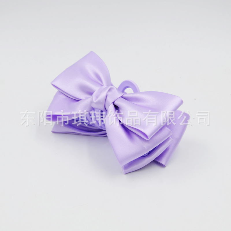 Qiwei Accessories' exclusive summer new bright double-sided large bow princess headwear in Korean style, simple and elegant, scratch-off for women Application Scenario