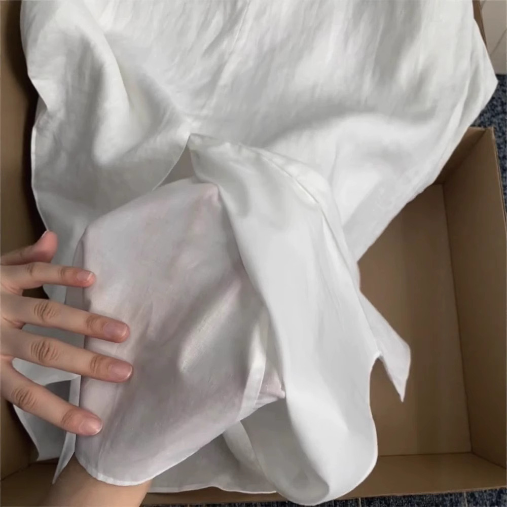 High-end white Tencel cotton linen skirt for women's summer 2025 new high-waisted long slit ramie dress details Picture