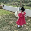 Korean-style children's clothing, girls' puffed-sleeve dress, summer stylish bow backless children's princess dress details Picture