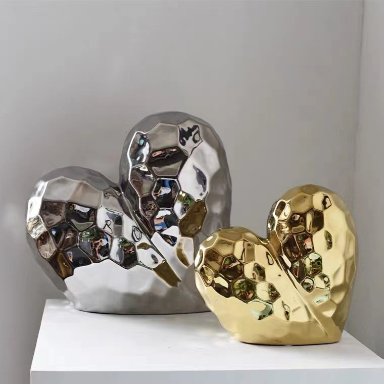 A modern, simple, pure electroplated gold and silver seven-color art in ins style heart-shaped model room living room display gift with a theme of love details Picture