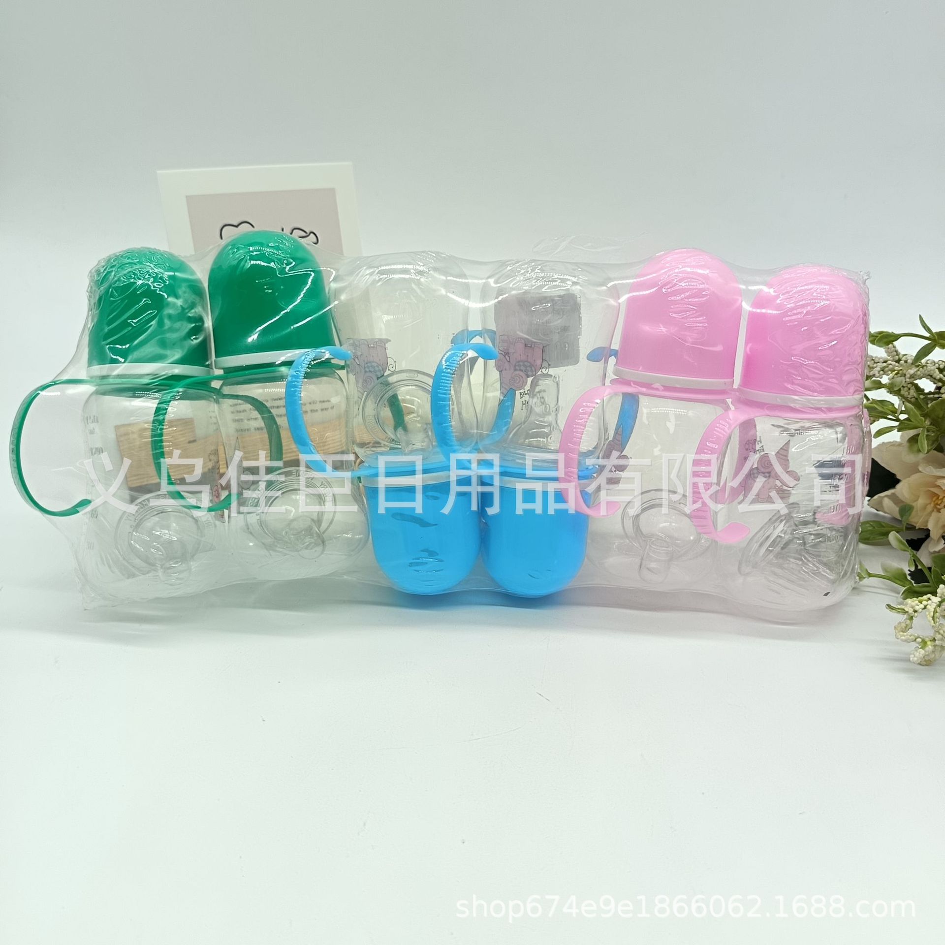 Cute and fun patterned baby learning drinking cups, baby drinking cups with handles, pacifiers and bottles for wholesale trade full figure