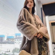 For the fall/winter 2022 season, women wear mink fur over an upscale, trendy coat