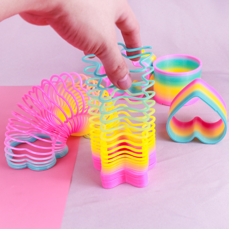 Large Special-Shaped Rainbow Ring Toy Children's Hot Love Star Rainbow Spring Stack Ring Stall Supply Application Scenario