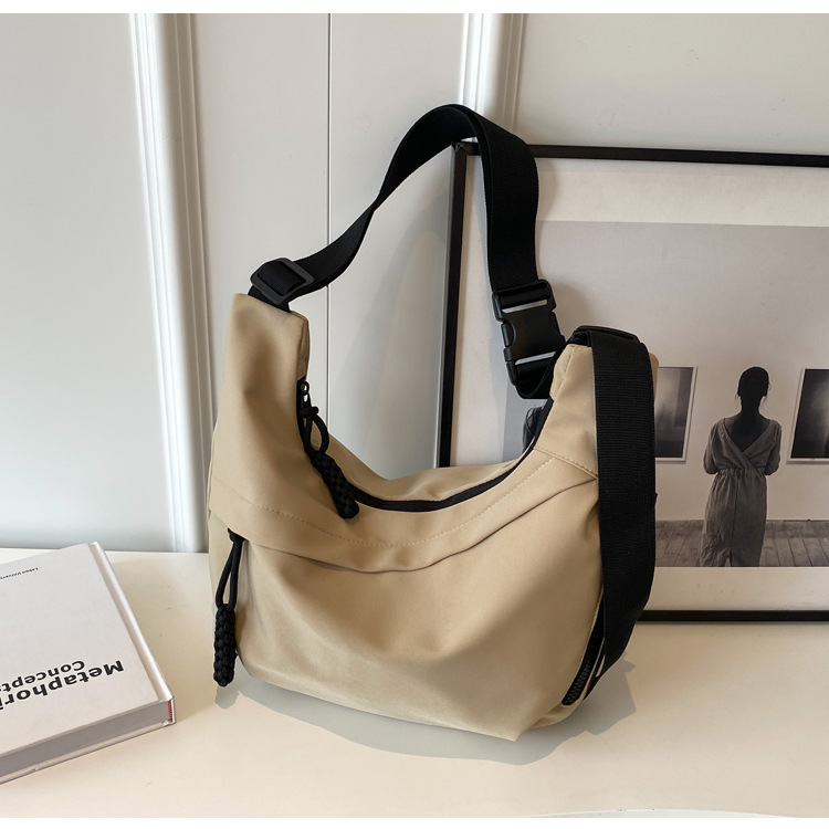 潮春新款大容量简约托特包女包单肩斜挎包时尚休闲箱包皮具男士包袋详情20