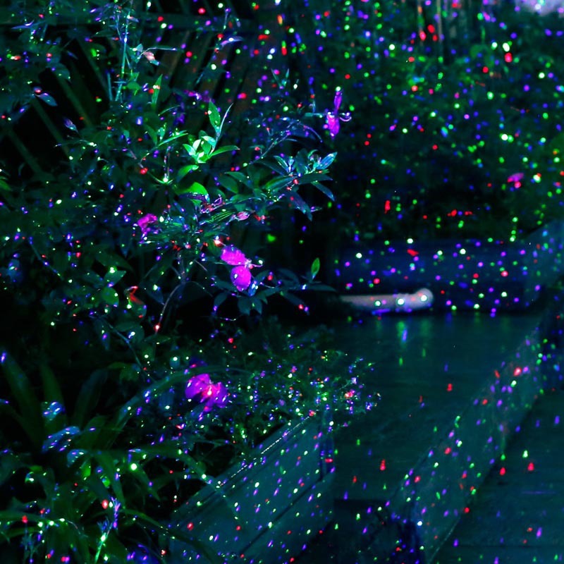 Realistic firefly lawn lights, garden projection lights, laser lights illuminate the park courtyard atmosphere and decorate it with stars all over the sky details Picture